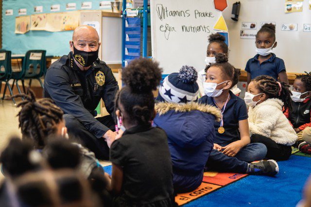 Dallas Police Chief and Students at a Book Fair
