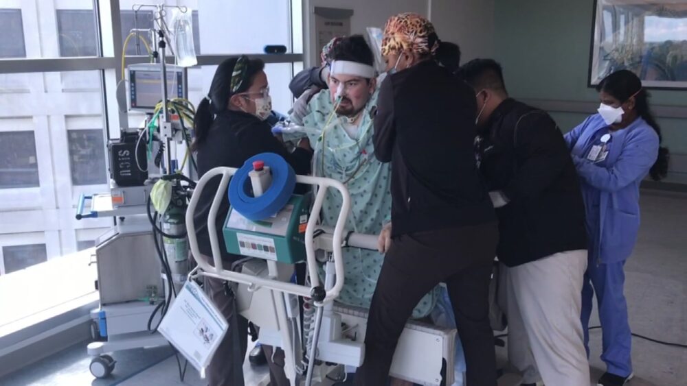 27-Year Old Stands for First Time in Months After COVID-19 Hospitalization