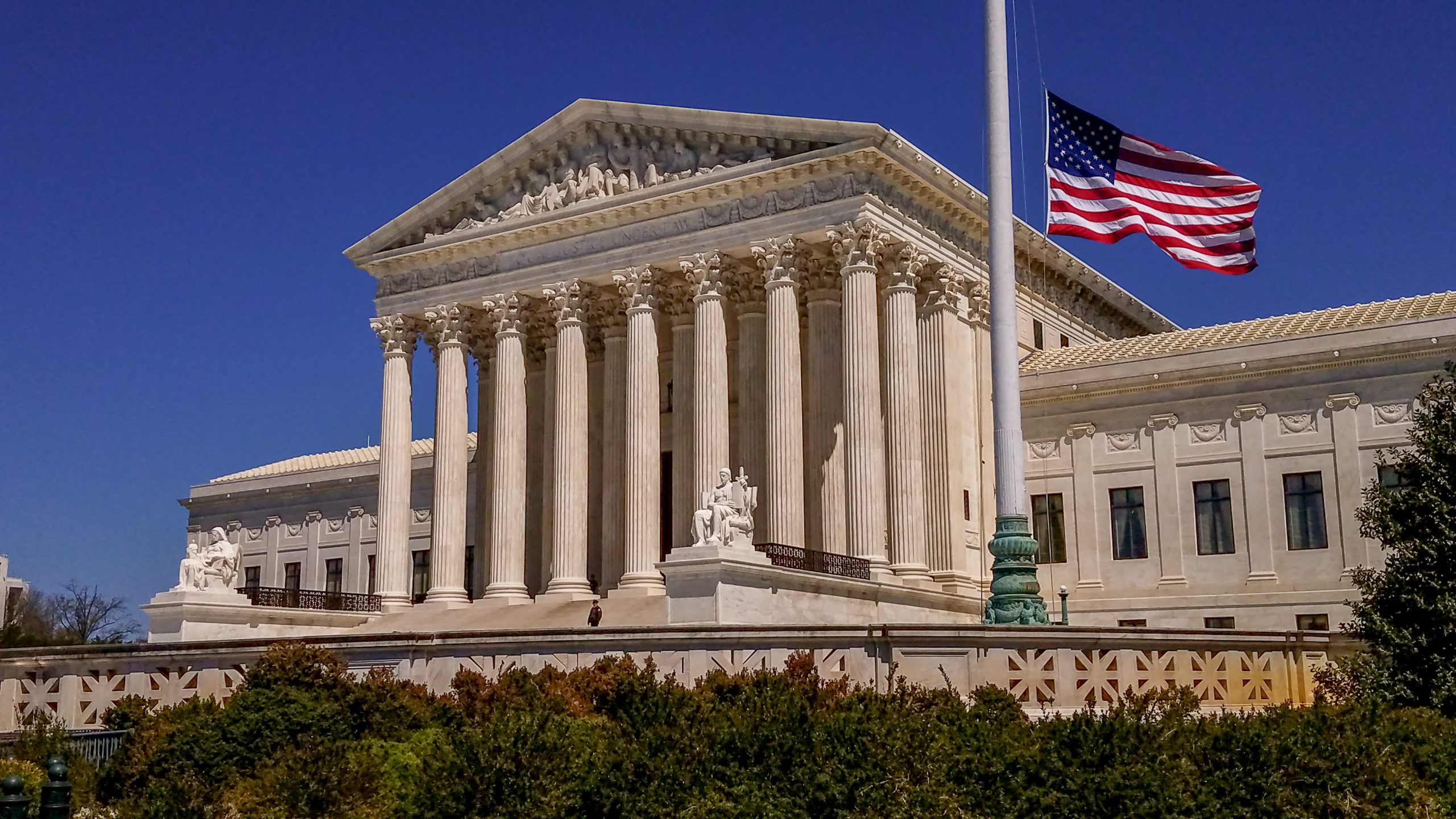 Supreme Court of the United States and American Flag in Washington, DC