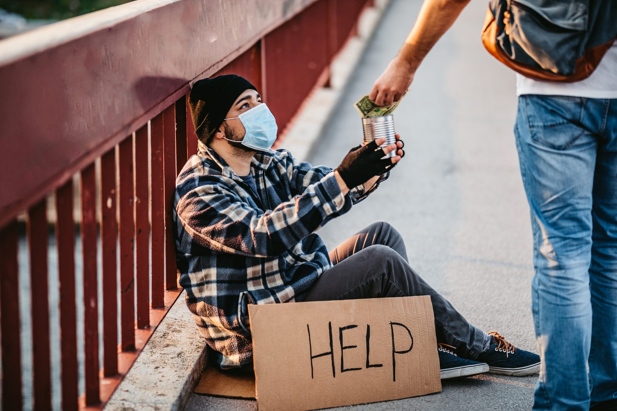 Homeless man begging for money