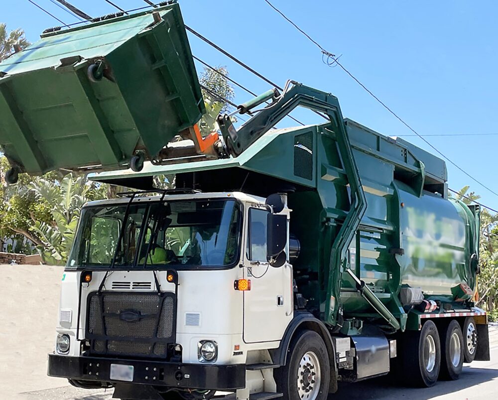 Garbage Truck Driver Dies after Being Pinned by Truck