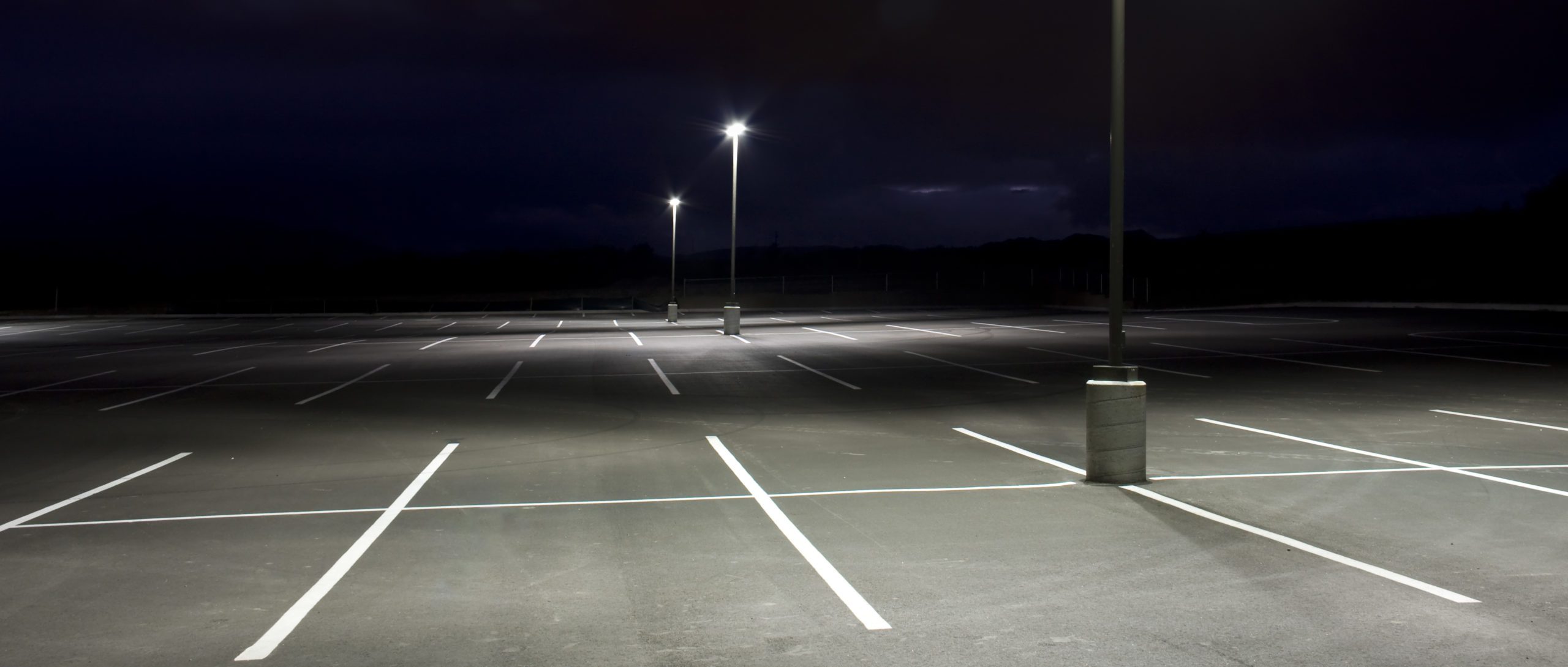 Empty parking lot with white lines