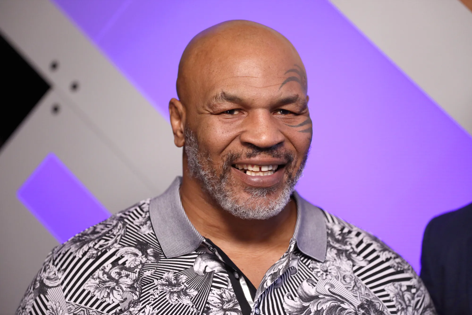 Mike Tyson Punches Man on Plane