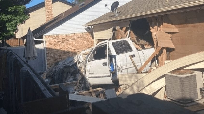 Truck Crashes into Home