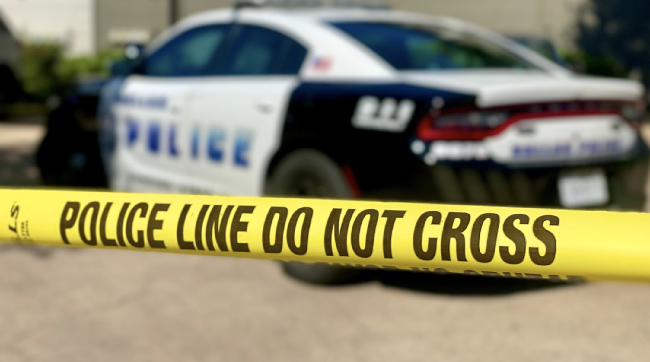 Dallas Police Unit behind Crime Scene Tape