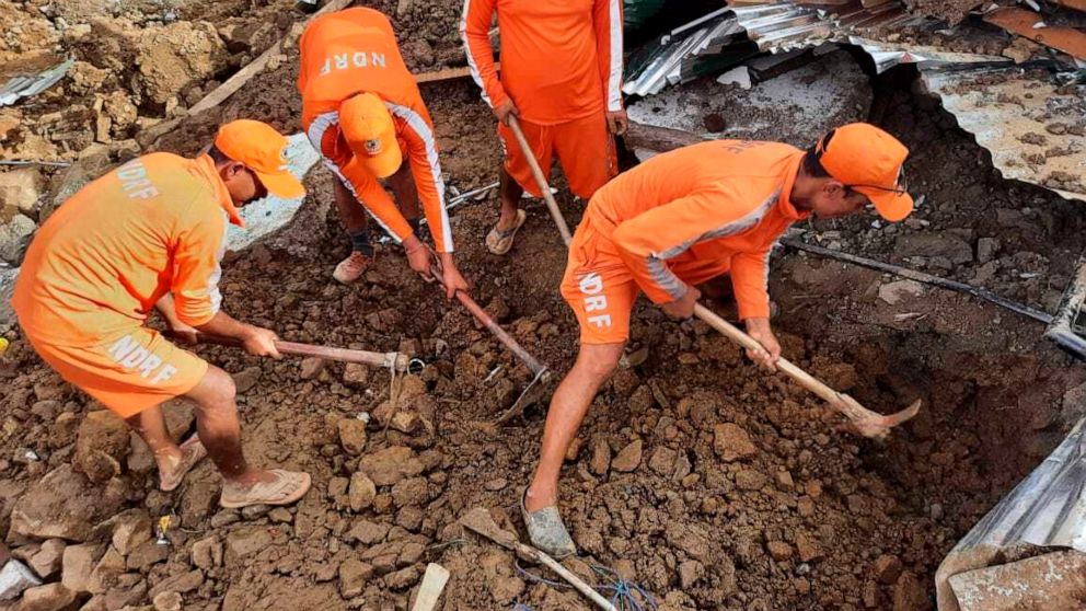 NDRF personnel trying to rescue those buried under the debris after a mudslide in Noney, northeastern Manipur state, India