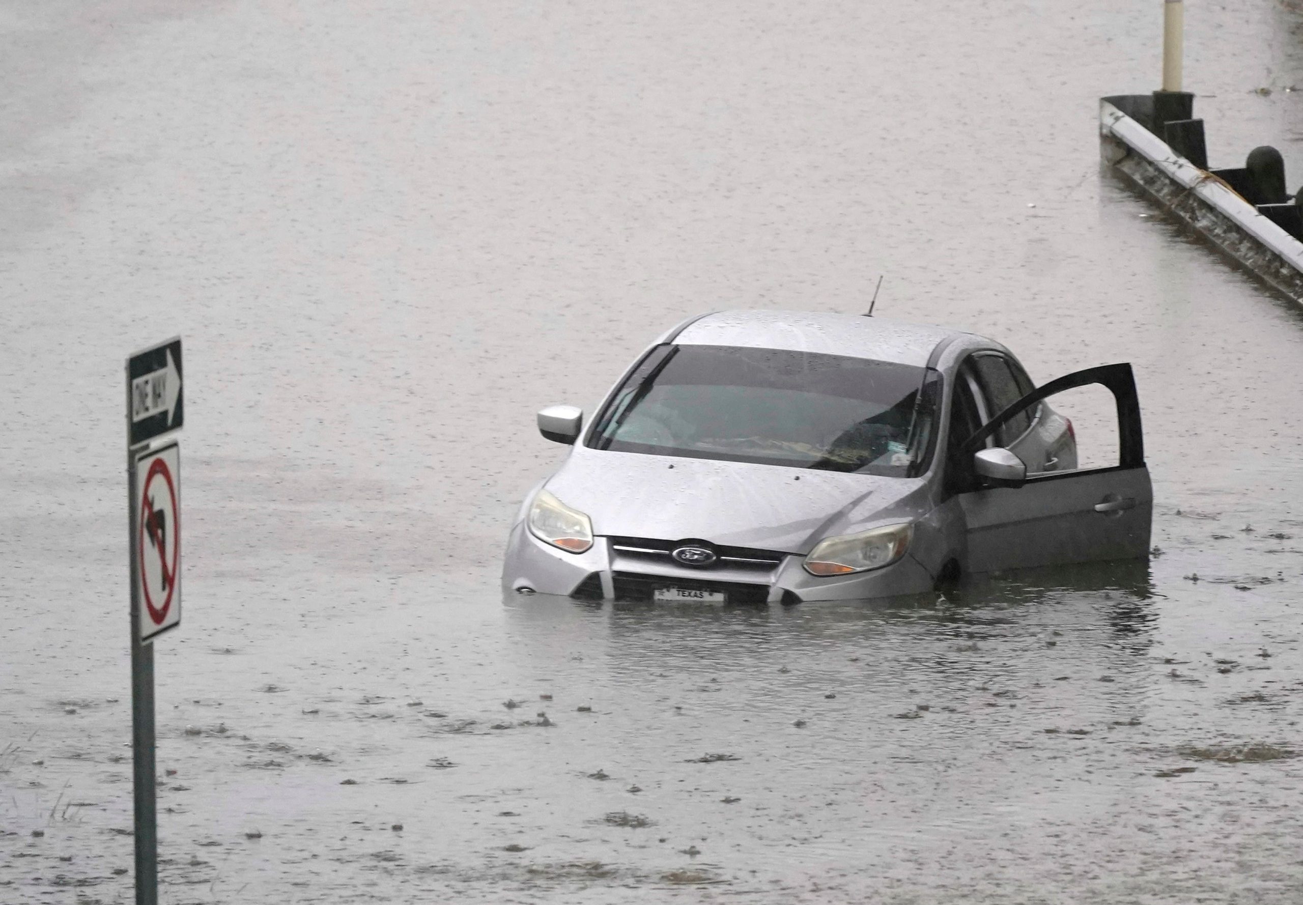 Woman Dies in Flash Flood-Swept Car