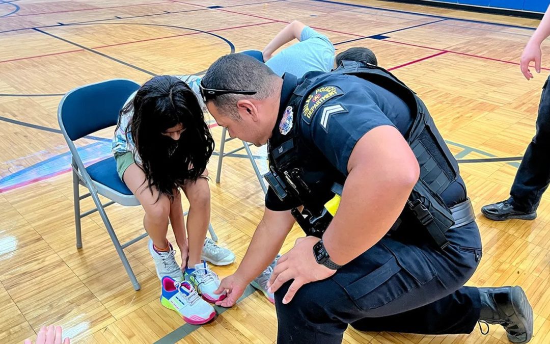 Dallas Police Give 500 Kids New Shoes