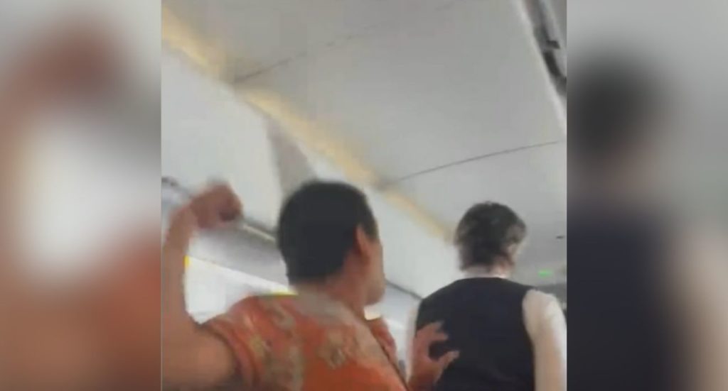 Video: Airline Passenger Attacks Flight Attendant