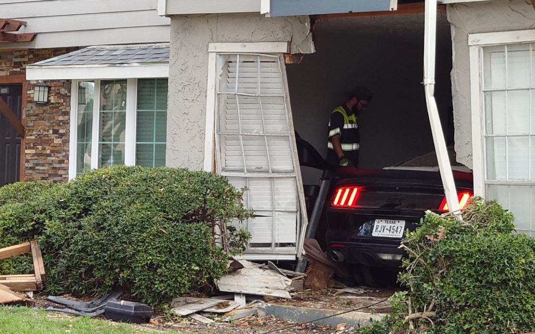 Car Crashes Into Apartment, Injuring Driver