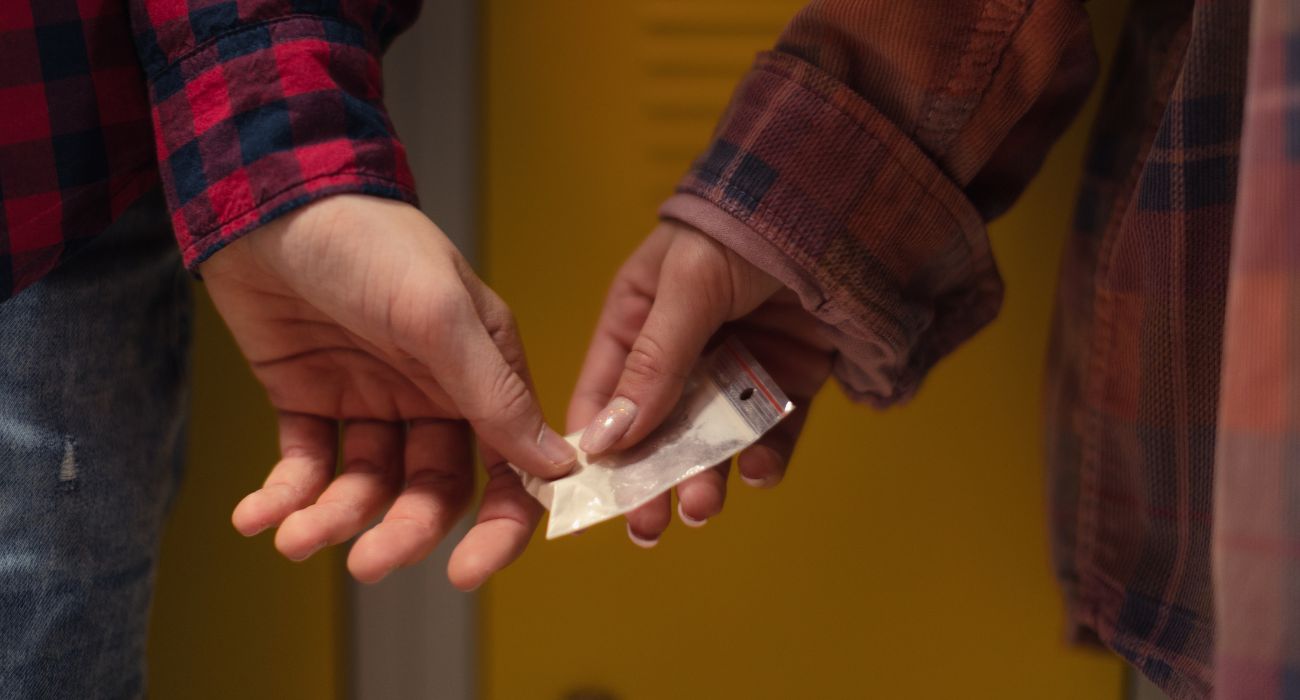 Students pass drugs in front of locker