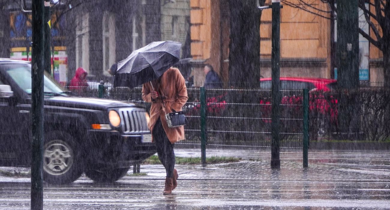 Woman walking in the rain