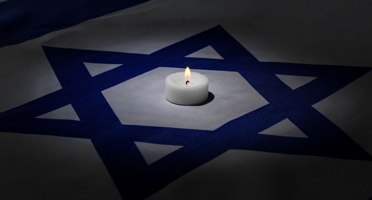 Candle on flag of Israel