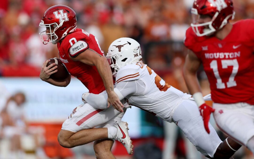 No. 8 Texas Holds Off Houston