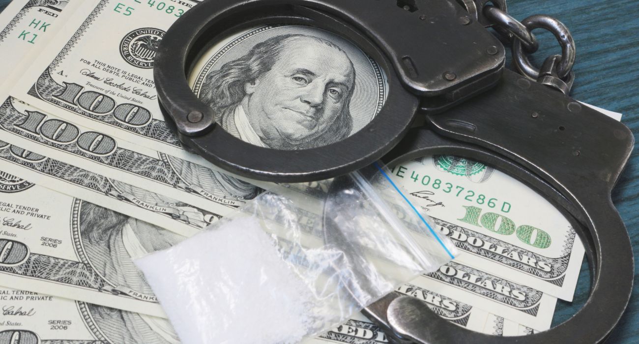 Drugs, money and handcuffs