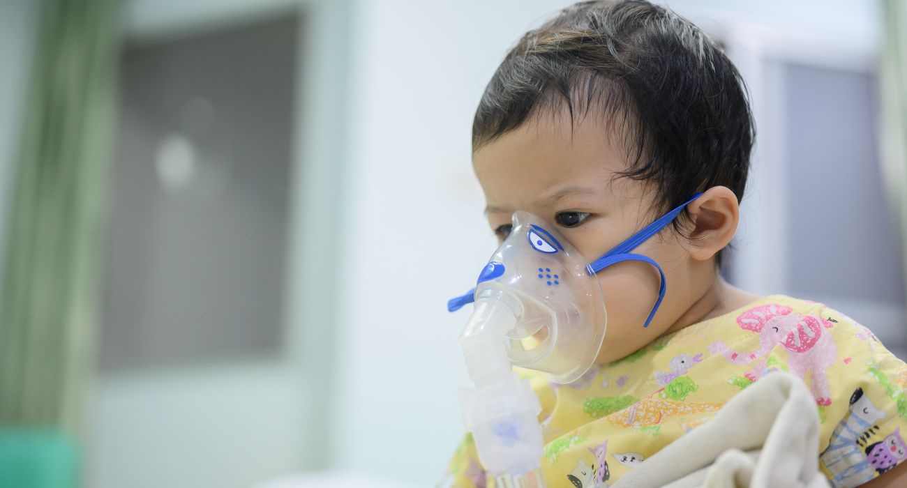 Child with RSV receives a breathing treatment