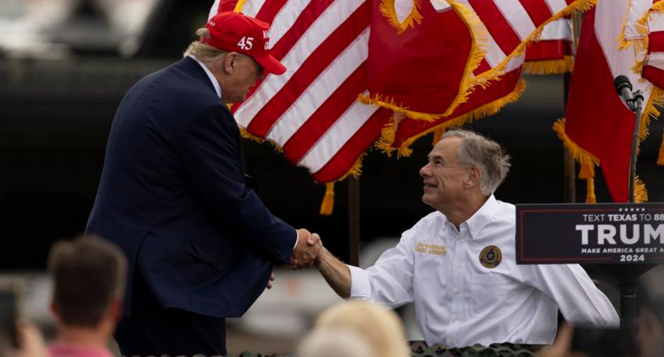 Former President Donald Trump shakes hands with Texas Governor Greg Abbott