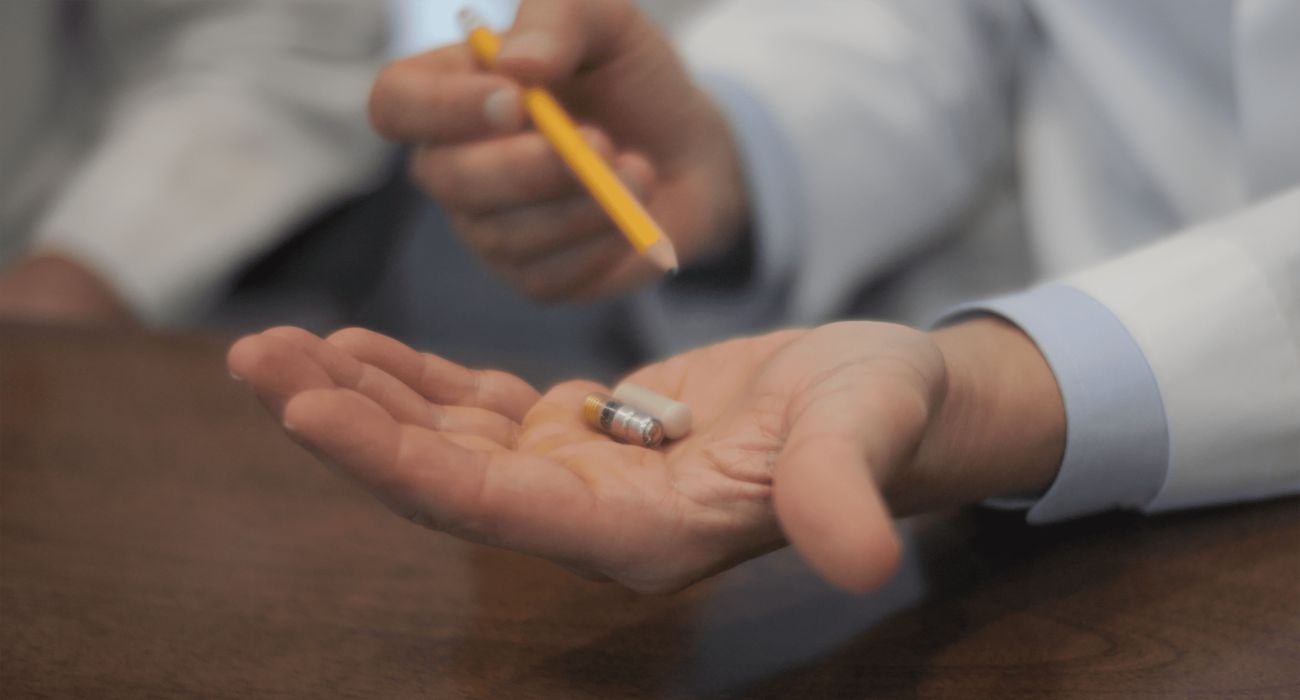 Ali Rezai, M.D., holds a Celero Systems VM Pill in his palm