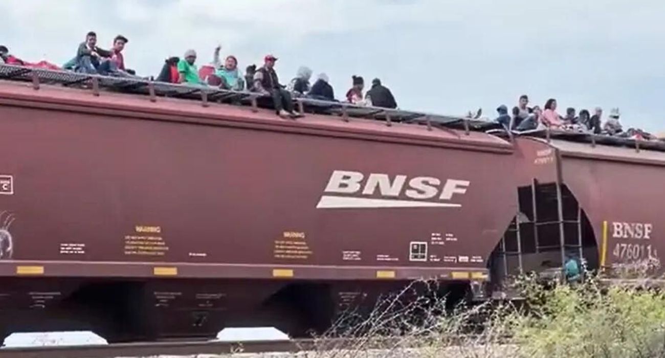 people riding a BNSF train