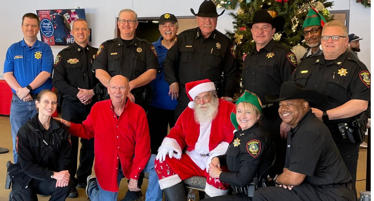 Tarrant County Sheriff's Office deputies pose with Santa