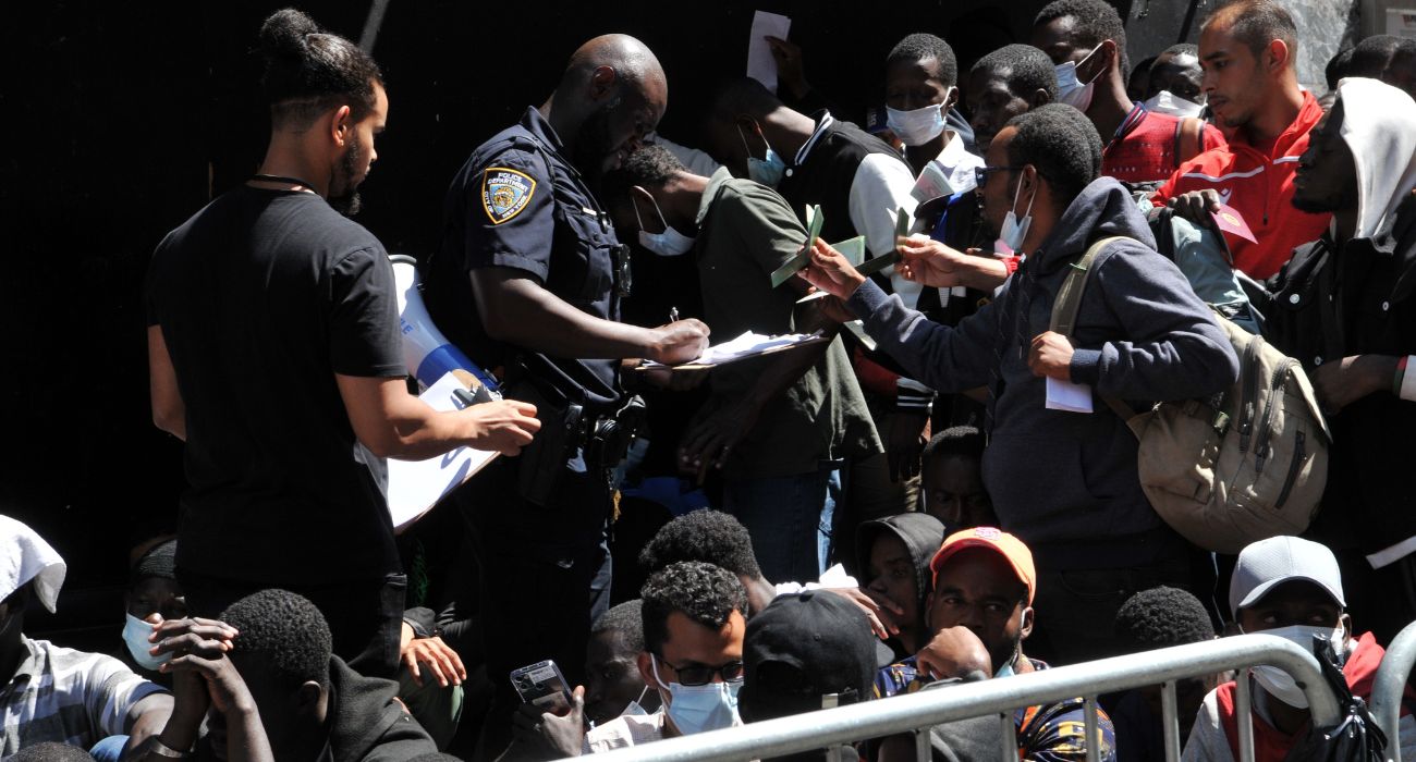 Unlawful migrants outside the Roosevelt Hotel in Midtown Manhattan in New York.