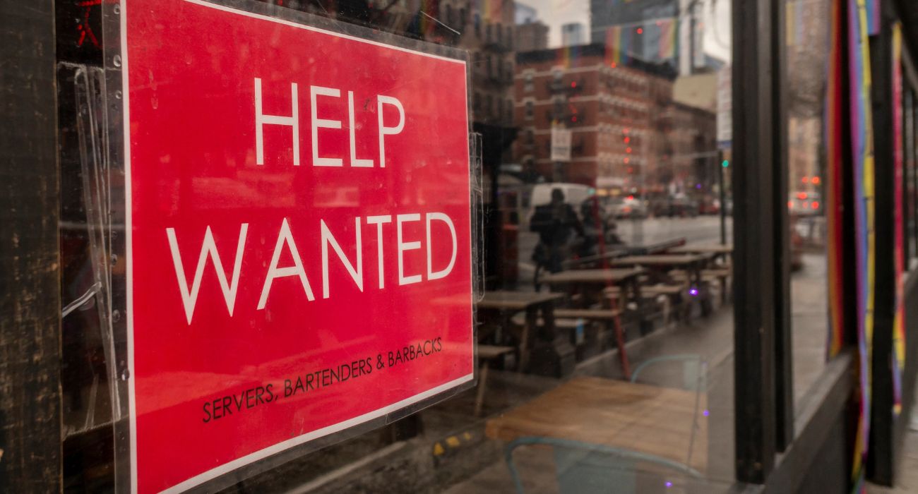 Help Wanted Sign in Window.