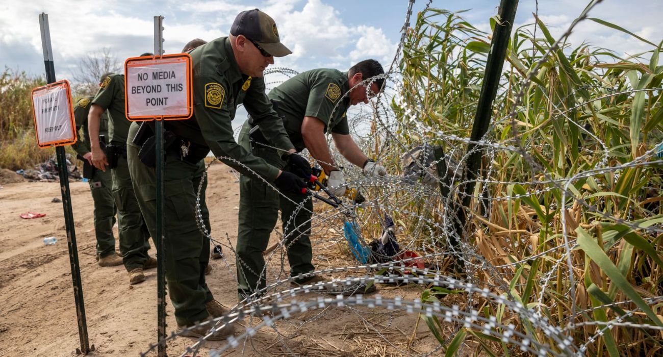 U.S. Border agents cut border wire.