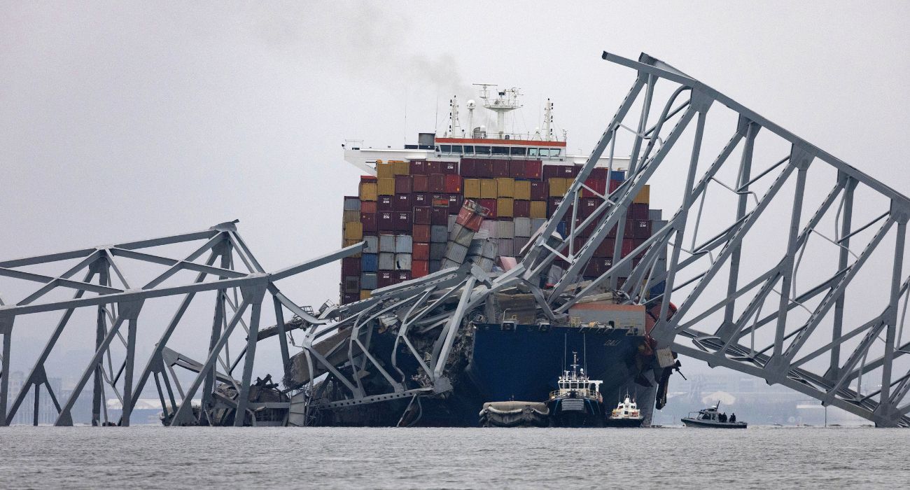 A loaded container ship collides into the Francis Scott Key Bridge