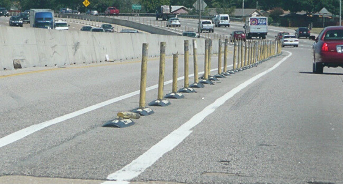 Plastic pylons used as lane separator.