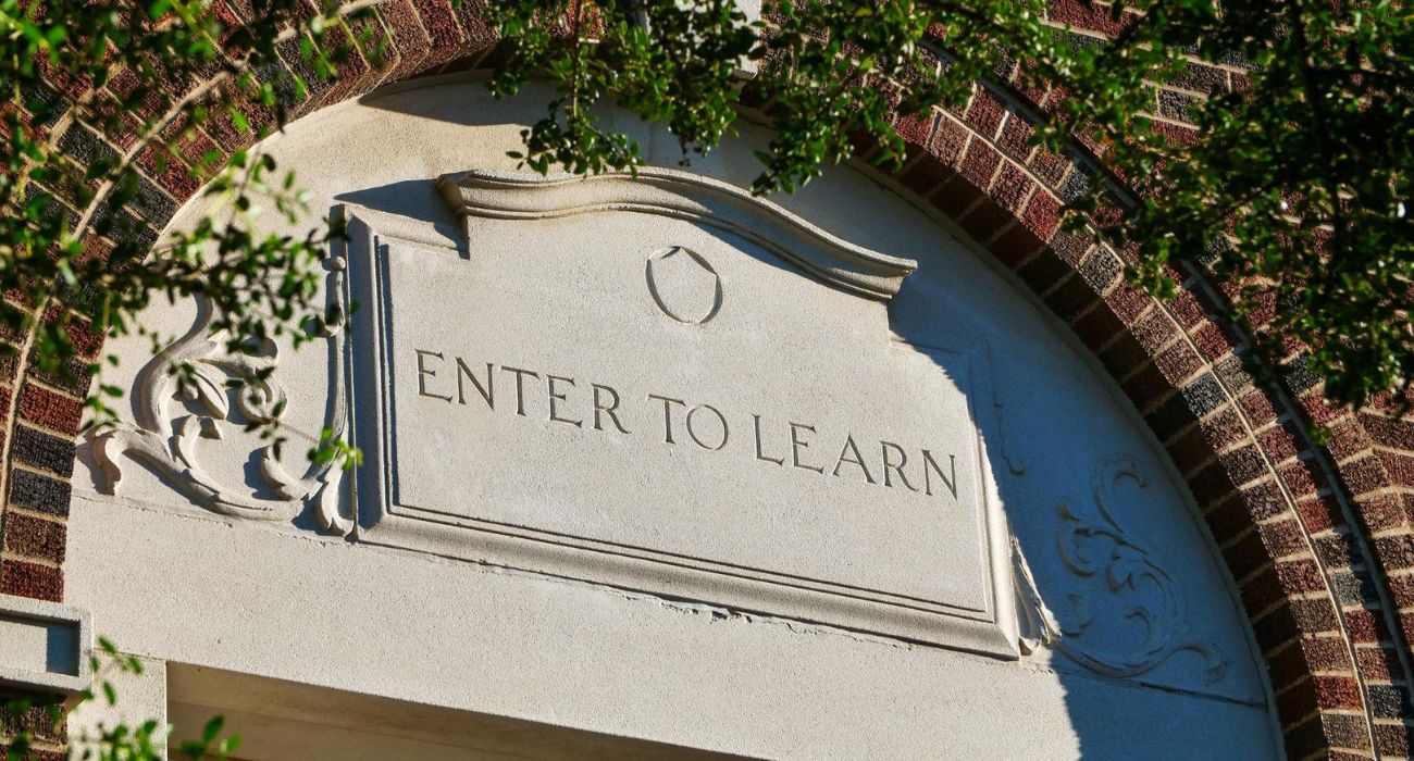 Enter To Learn above doorway