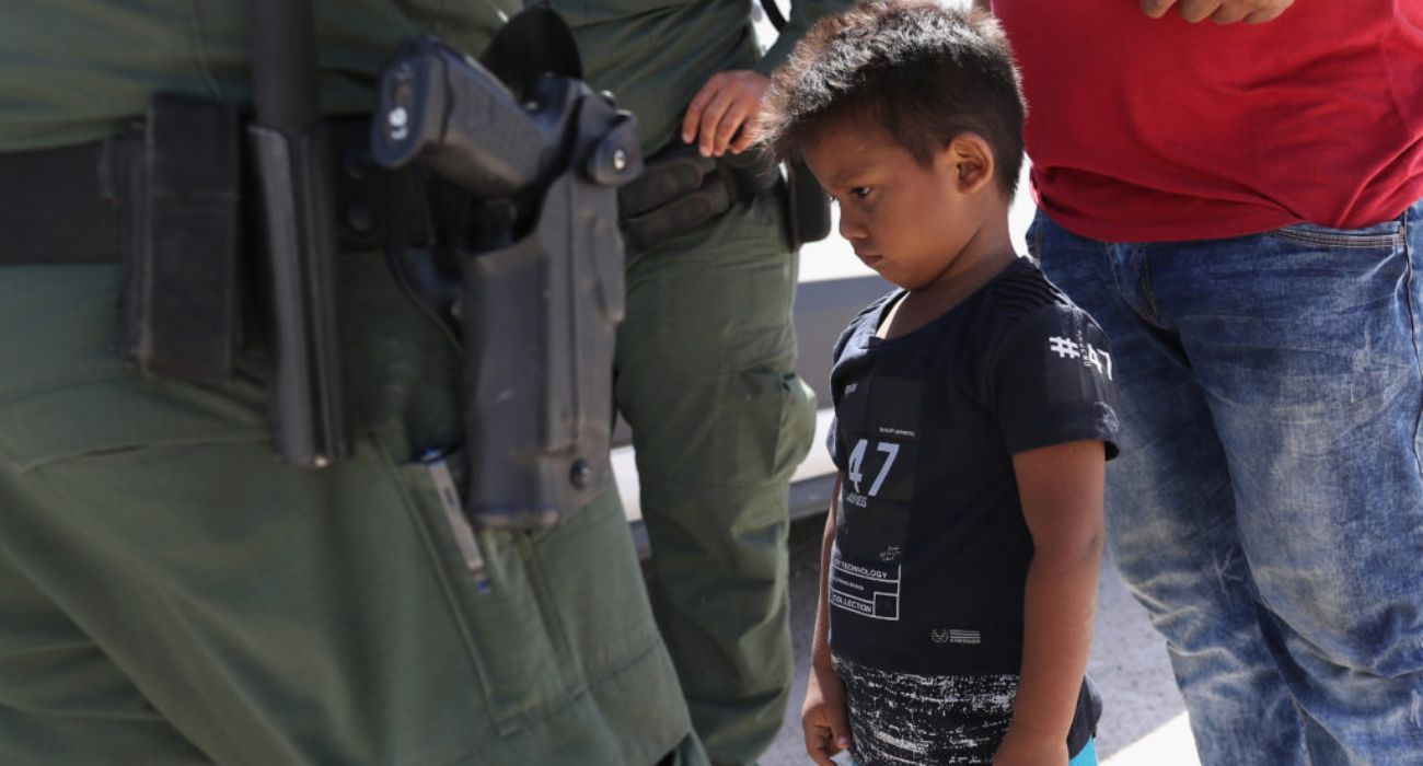 Unaccompanied minor with border patrol agents