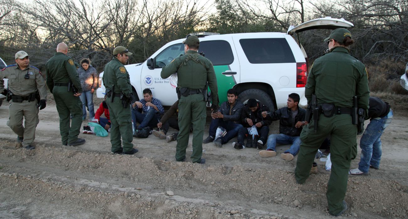 U.S. Customs and Border Patrol Agents detain unlawful migrants