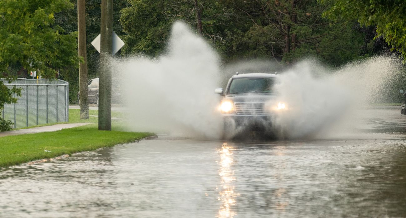 Vehicle driving on flooded road