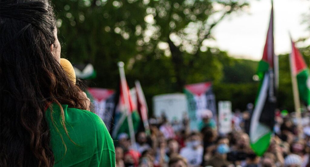 Speaker in front of pro-palestinian crowd