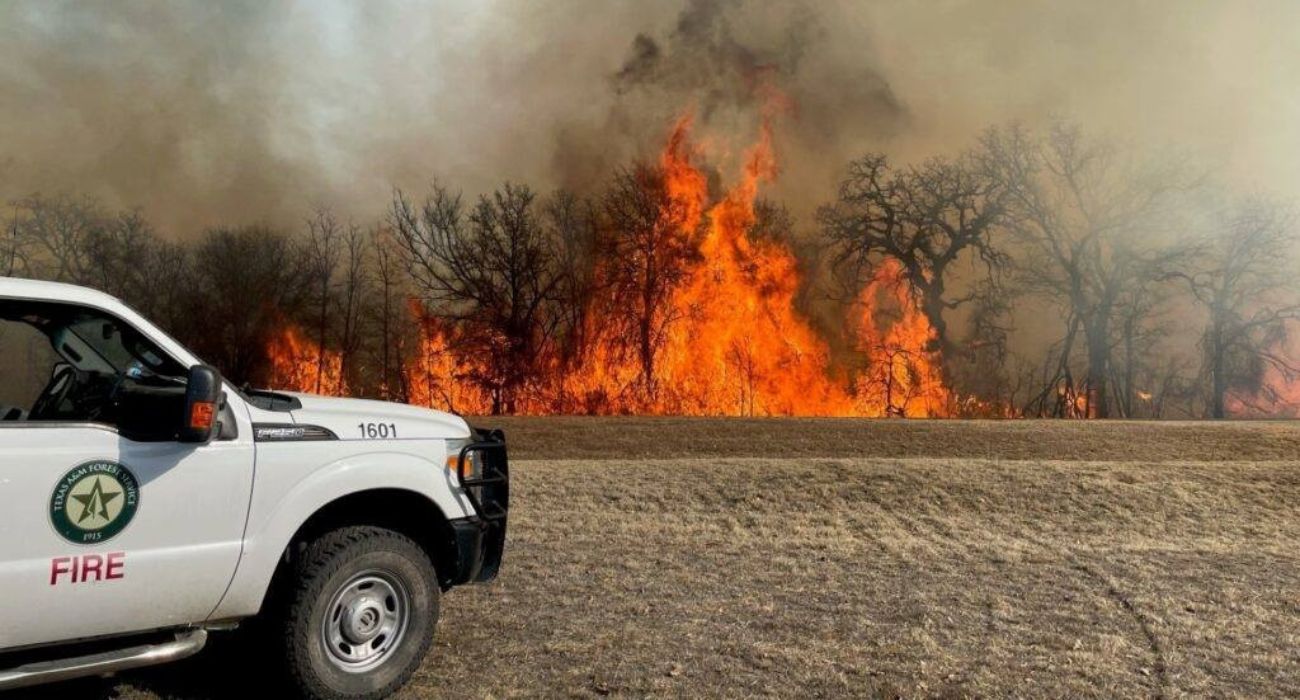 Texas A&M Forest Service vehicle near a wildfire