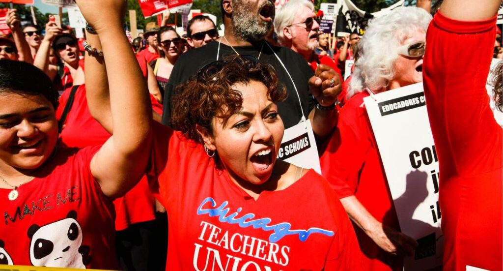 Teachers and their supporters attend a rally at Union Park in Chicago. | Image by Scott Olson/Getty Images