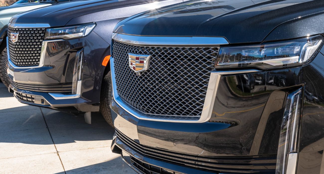 Cadillac Escalades | Image by woodsnorthphoto/Shutterstock