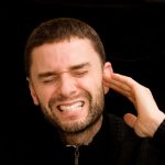 Why That Ringing In Your Ears Happens: Habits That Make It Worse