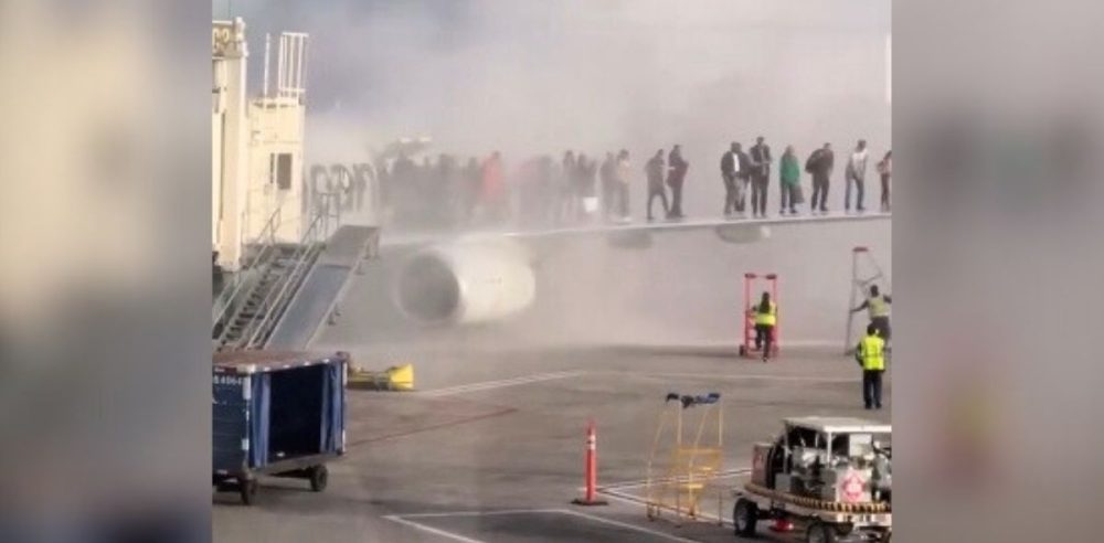 Passengers Exit Onto Wing As Plane Burns