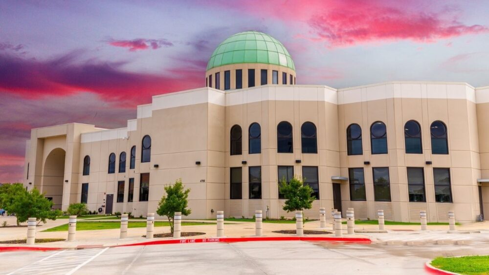 DOJ Dives Into Paxton, Abbott’s Probe Of Contentious Islamic Enclave