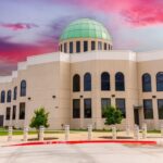 DOJ Dives Into Paxton, Abbott’s Probe Of Contentious Islamic Enclave