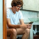 Two Days Down The Drain: Americans Spend 49 Hours A Year Using Phones In The Bathroom