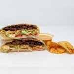 Identical Twins Jovan And Josh Launch First Vegan Booth At Texas State Fair