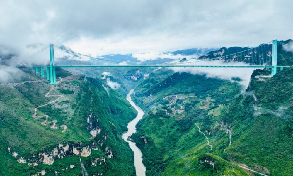 China Opens World’s Tallest Bridge, Coffee Shop Included
