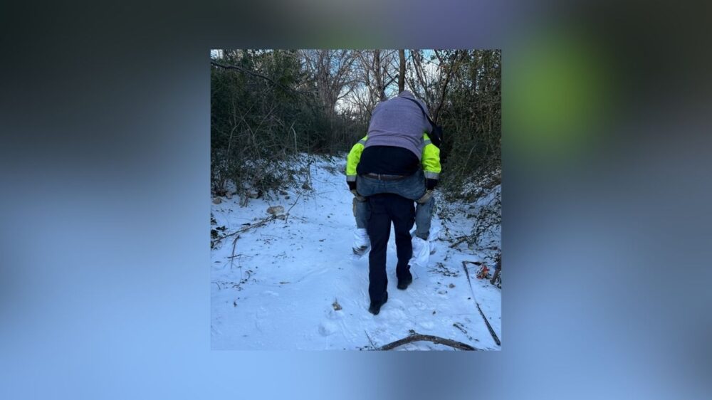 Homeless Man Seizes Mid-Rescue—Fort Worth Firefighters Carry Him To Safety On Icy Slope