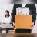 Wave of Layoffs Hits Dow And Major Firms As Companies Pivot To AI And Automation