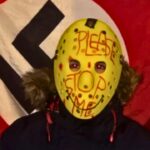 Fear-Mongering: Masked “Endtex” Group Threatens 14 Texas Schools