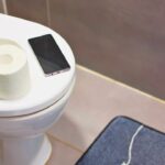 Toilet Scrolling May Be A Pain In The Rear, Study Suggests