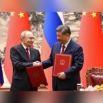 Xi, Putin Showcase Closer Ties During Beijing Meeting