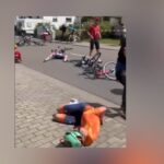 Cyclist Sent Flying After Mobility Scooter Rolls Onto Race Course